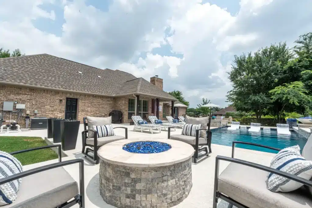 Elegant backyard pool with seating area