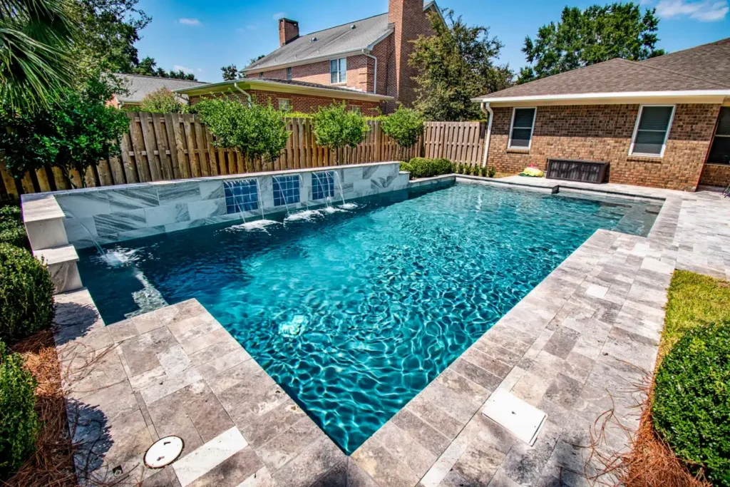 Modern pool with stone patio