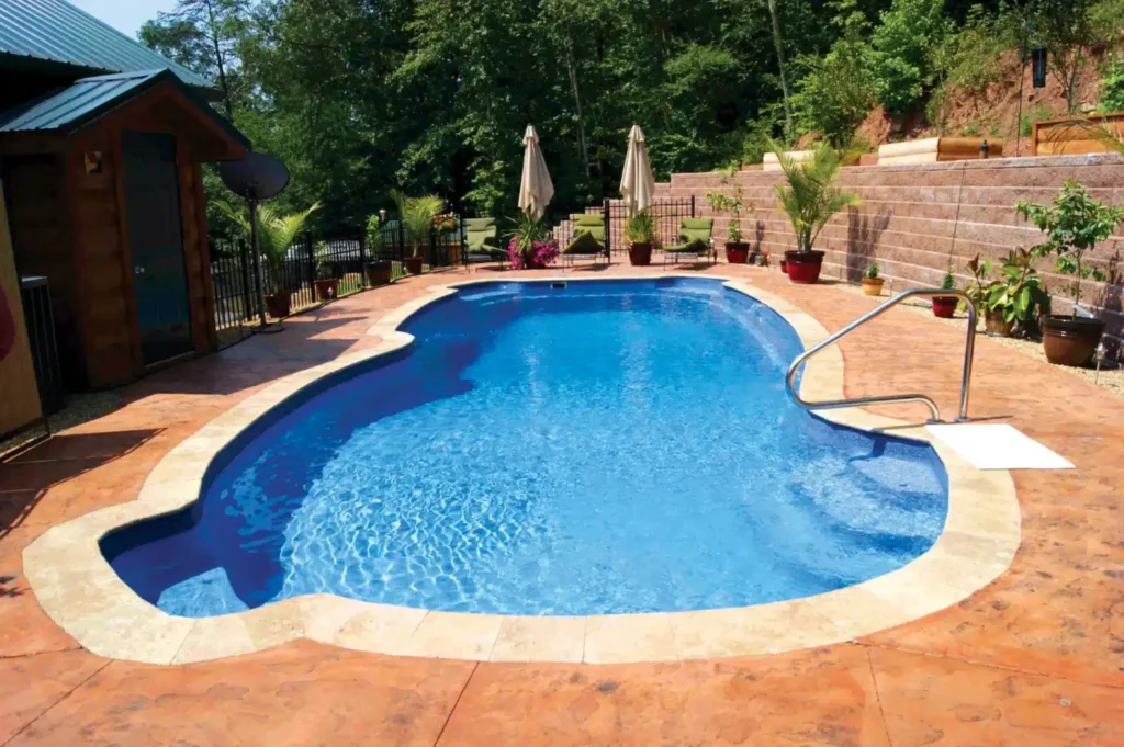Beautiful swimming pool with landscaping.