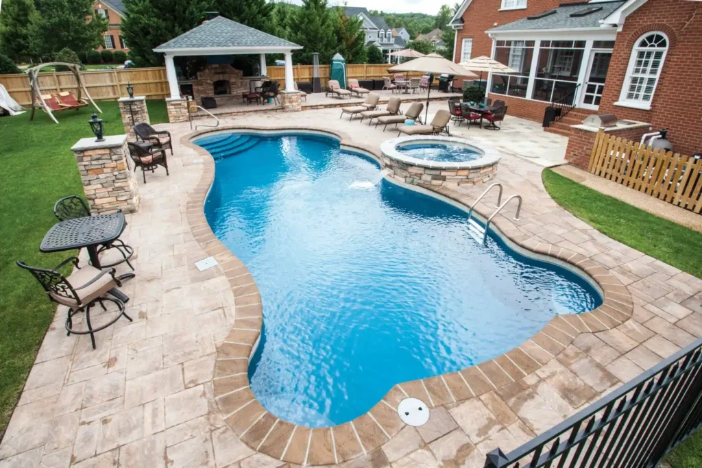 Elegant backyard pool with spa